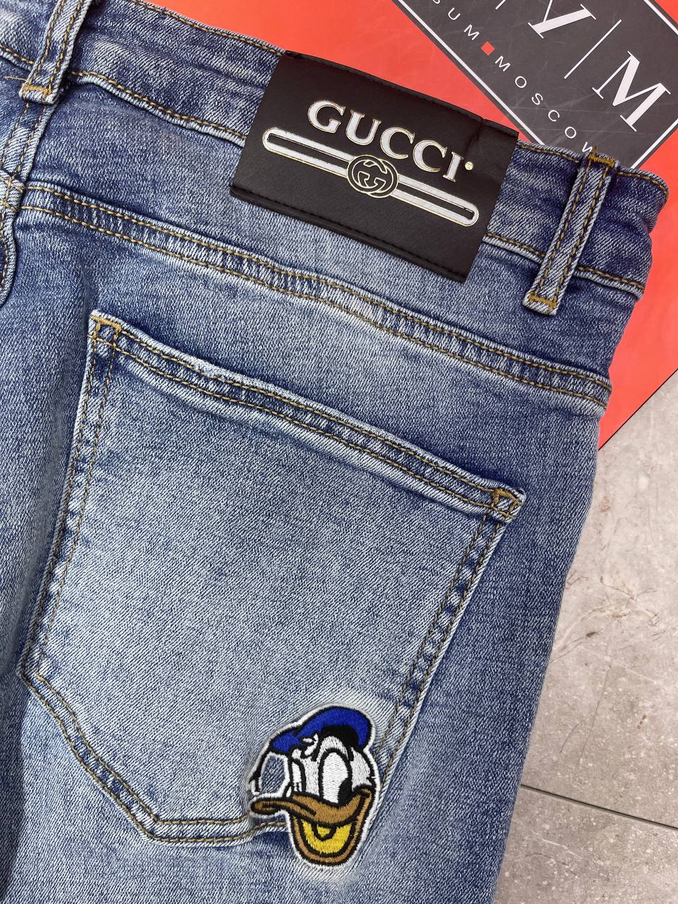 Джинсы Gucci — фото 9